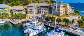 A group of boats in a harbor