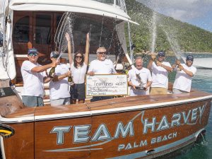 angler fishing crew on a sport fish boat with winning prizes