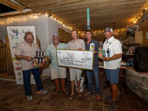 group of fishing anglers with fishing tournament winning prizes