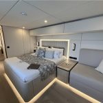 a master bedroom on a sailing catamaran yacht chater