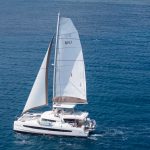 a catamaran sailboat sailing in the Caribbean