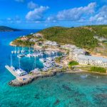 a marina and resort on a private island in the Caribbean
