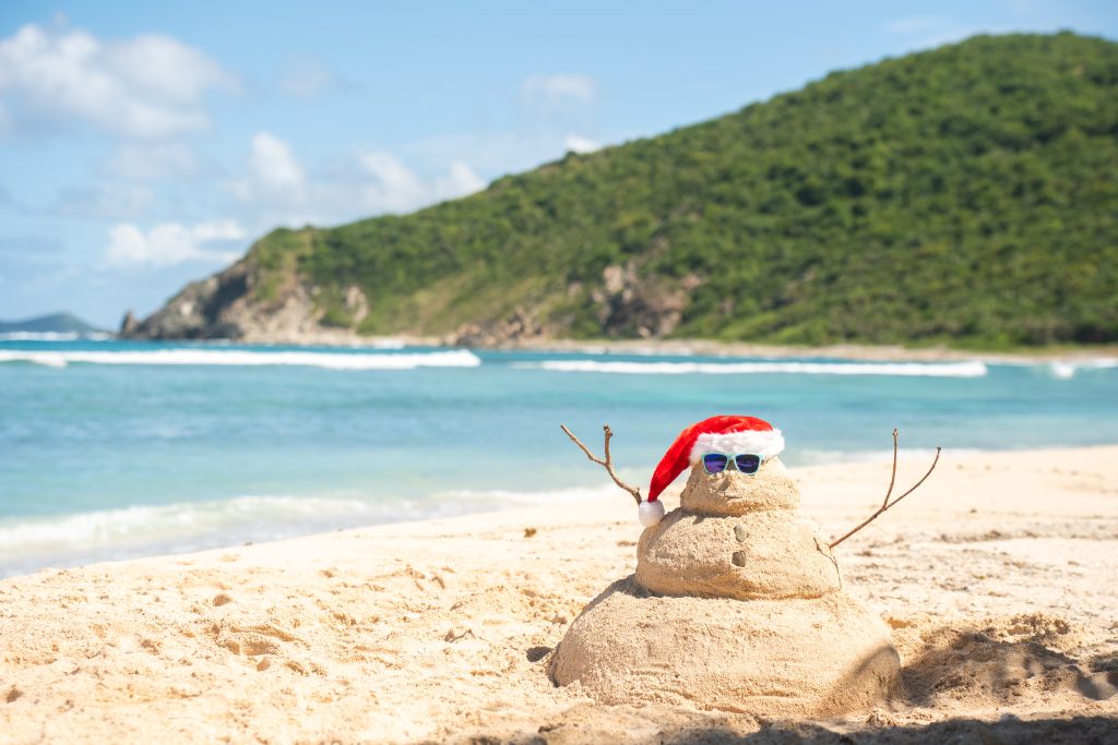 an image of a sand Santa on a caribbean island beach