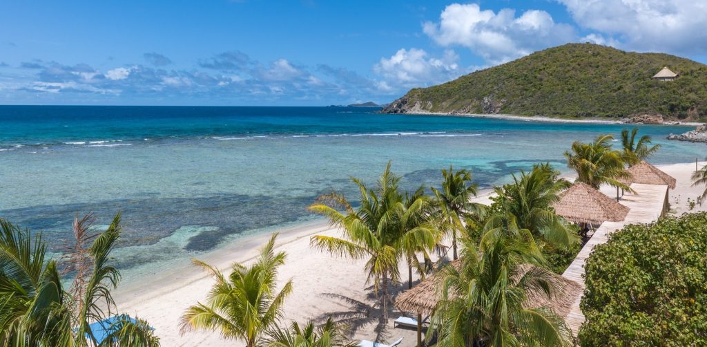 aerial view of North Beach on Scrub Island with cabanas and beach